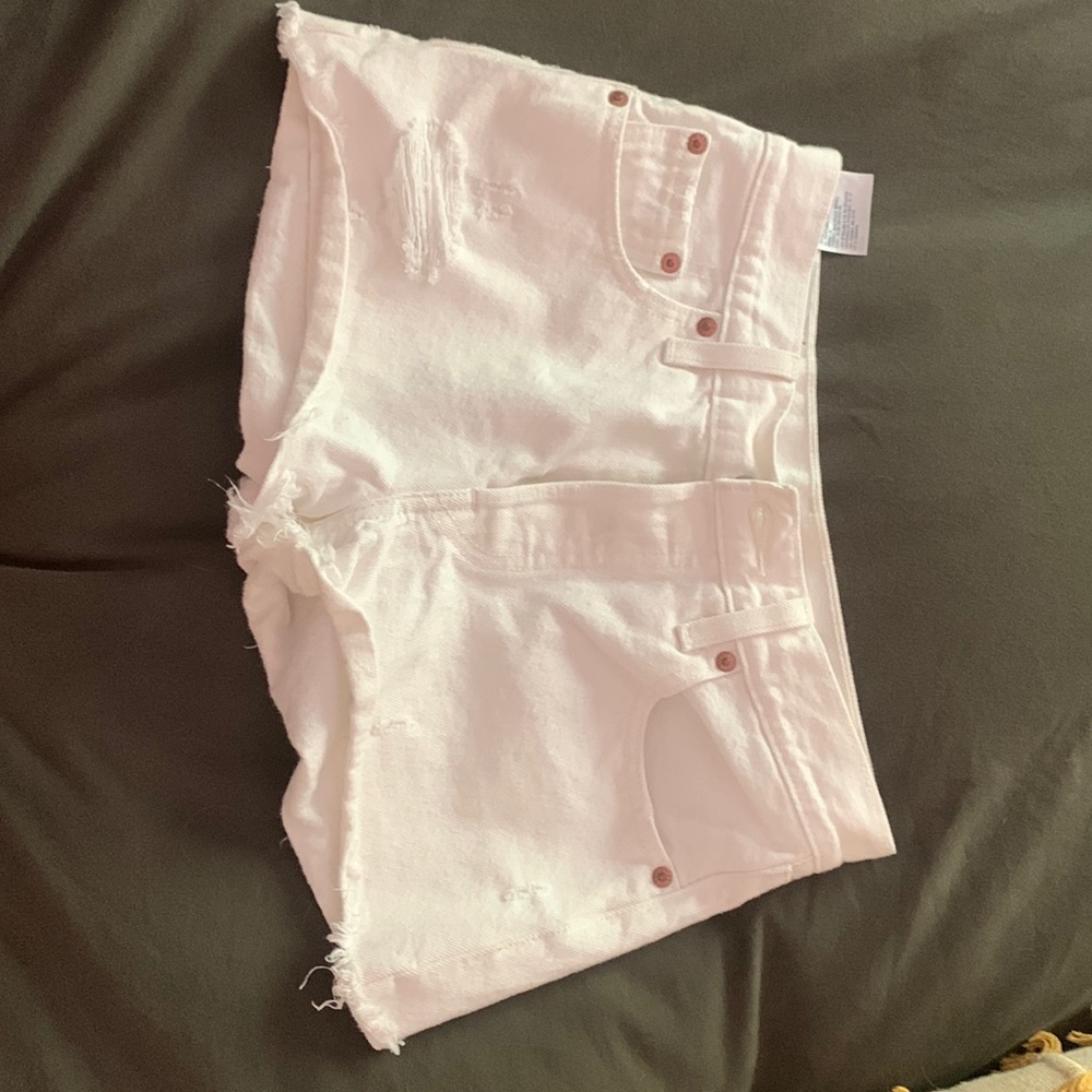 White Levi button fly shorts